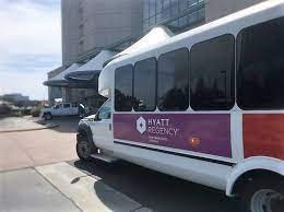 marriott irvine shuttle van parked infront of hotel