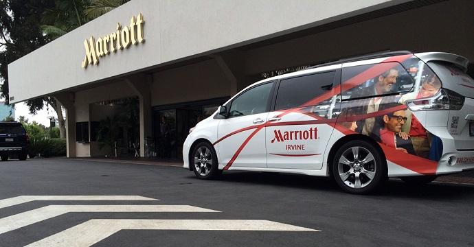 marriott irvine shuttle van parked infront of hotel